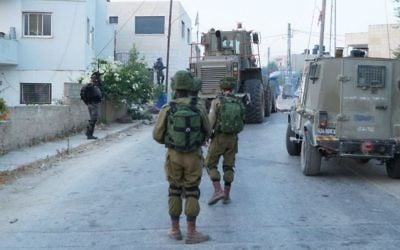 IDF forces operate in the West Bank settlement of Halamish on July 23, 2017. (IDF spokesman)
