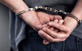 Illustrative: A person being arrested. (BrianAJackson via iStock by Getty images)