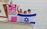 Guy Cohen, left, with children Noa, center, and Matan on July 23, 2017 ahead of the New York swim. (Judah S. Harris)