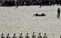 French President Emmanuel Macron (C, top) attends a tribute ceremony for French politician and Holocaust survivor Simone Veil in the courtyard of the Invalides in Paris, France, on July 5, 2017.  (AFP PHOTO / ALAIN JOCARD)