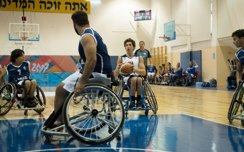 The USA looks to score against Israel in the first wheelchair basketball competition of the 2017 Maccabiah Games, July 9, 2017. (Luke Tress/Times of Israel) The USA looks to score against Israel in the first wheelchair basketball competition of the 2017 Maccabiah Games, July 9, 2017. (Luke Tress/Times of Israel)