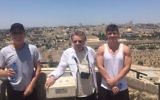 Frankie Valli (center) and his son (right) at the Haas Promenade overlooking Jerusalem's Old City (Courtesy Nidar Oz Communications)