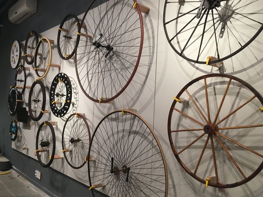 A wall of bike wheels at '2 x 200,' the new exhibit at the Bloomfield Science Museum (Courtesy Tal Barlev) A wall of bike wheels at '2 x 200,' the new exhibit at the Bloomfield Science Museum (Courtesy Tal Barlev)