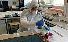 Illustrative: Dr. Jari Louhelainen conducts DNA testing in 2014. (Jari Louhelainen/AFP)