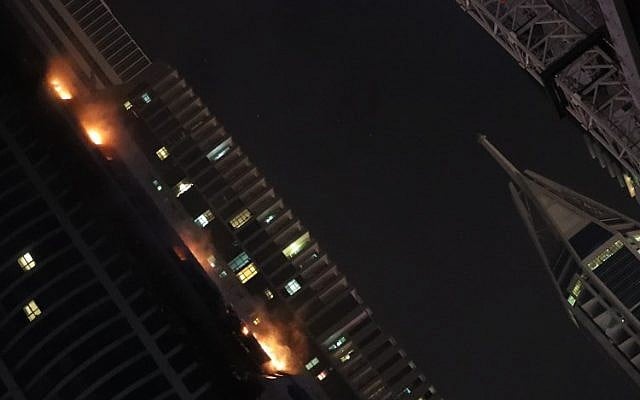 Fire is seen at the 1,105 foot tall Torch tower skyscraper, August 4, 2017 in Dubai. (AFP PHOTO/KARIM SAHIB) Fire is seen at the 1,105 foot tall Torch tower skyscraper, August 4, 2017 in Dubai. (AFP PHOTO/KARIM SAHIB)
