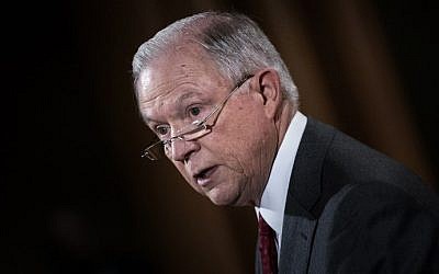 US Attorney General Jeff Sessions speaks at the Department of Justice during an announcement about leaking of classified information on August 4, 2017. (AFP Photo/Brendan Smialowski)