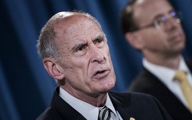 Director of National Intelligence Dan Coats speaks at the Department of Justice on August 4, 2017. (AFP Photo/Brendan Smialowski)