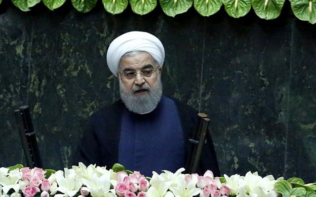 Iran's President Hassan Rouhani delivers a speech after being sworn in before parliament in Tehran, on August 5, 2017. (AFP PHOTO / ATTA KENARE) Iran's President Hassan Rouhani delivers a speech after being sworn in before parliament in Tehran, on August 5, 2017. (AFP PHOTO / ATTA KENARE)