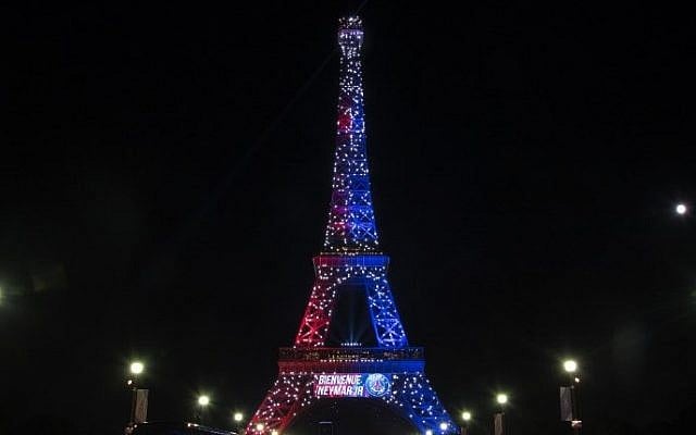 Red and blue lights and a welcoming message that reads in French "Welcome Neymar" adorn the Eiffel Tower to celebrate the arrival of Brazilian footballer Neymar to Paris, August 5, 2017. (AFP/OLIVIER MORIN) Red and blue lights and a welcoming message that reads in French "Welcome Neymar" adorn the Eiffel Tower to celebrate the arrival of Brazilian footballer Neymar to Paris, August 5, 2017. (AFP/OLIVIER MORIN)