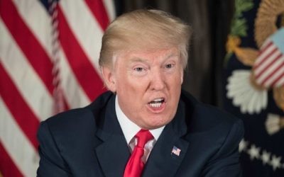 US President Donald Trump speaks about North Korea at a meeting with administration officials on the opioid addiction crisis at the Trump National Golf Club in Bedminster, New Jersey, on August 8, 2017. AFP/ NICHOLAS KAMM)