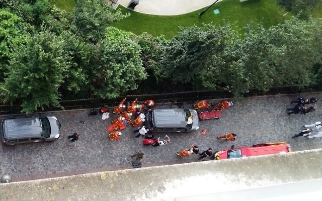 Police and rescue workers gather near the scene of a suspected car-ramming attack on French soldiers on patrol in the Paris suburb of Levallois-Perret on August 9, 2017. (AFP Photo/Thierry Chappe) Police and rescue workers gather near the scene of a suspected car-ramming attack on French soldiers on patrol in the Paris suburb of Levallois-Perret on August 9, 2017. (AFP Photo/Thierry Chappe)