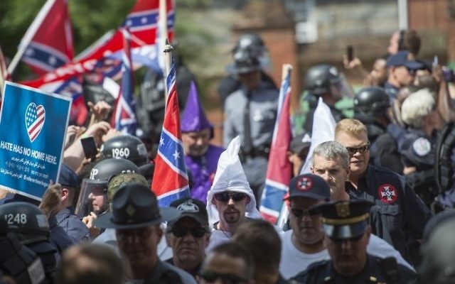 Members of the Ku Klux Klan and others arriving for a rally calling for the protection of Confederate monuments in Charlottesville, Virginia, July 8, 2017. (AFP Photo/Andrew Caballero-Reynolds) Members of the Ku Klux Klan and others arriving for a rally calling for the protection of Confederate monuments in Charlottesville, Virginia, July 8, 2017. (AFP Photo/Andrew Caballero-Reynolds)