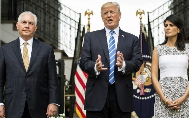 US President Donald Trump speaks to the press with US Secretary of State Rex Tillerson (L) and Ambassador to the United Nations Nikki Haley (R) on August 11, 2017, at Trump National Golf Club in Bedminster, New Jersey. (AFP Photo/Jim Watson) US President Donald Trump speaks to the press with US Secretary of State Rex Tillerson (L) and Ambassador to the United Nations Nikki Haley (R) on August 11, 2017, at Trump National Golf Club in Bedminster, New Jersey. (AFP Photo/Jim Watson)