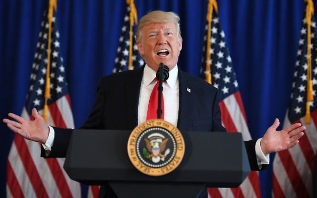 US President Donald Trump speaks to the press at Trump National Golf Club in Bedminster, New Jersey, on August 12, 2017. (AFP Photo/Jim Watson)