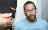 Tal Silberstein, an adviser to Austrian Chancellor Christian Kern, arrives at the Rishon Lezion Magistrate's Court on August 14, 2017. (AFP PHOTO / JACK GUEZ)