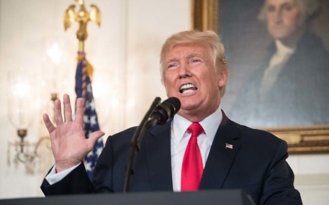 US President Donald Trump makes a statement in the Diplomatic Room at the White House on August 14, 2017. (AFP Photo/Nicholas Kamm)