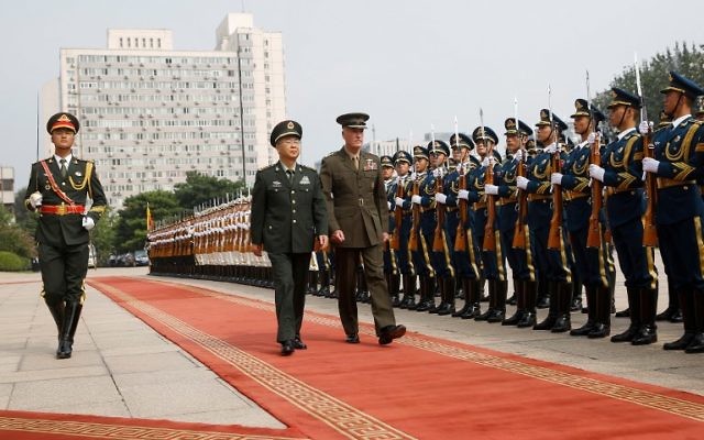 US Gen. Joseph Dunford, third left, and his Chinese counterpart General Fang Fenghui attend a welcoming ceremony in Beijing on August 15, 2017.(AFP/POOL/THOMAS PETER) US Gen. Joseph Dunford, third left, and his Chinese counterpart General Fang Fenghui attend a welcoming ceremony in Beijing on August 15, 2017.(AFP/POOL/THOMAS PETER)