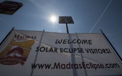 A sign welcoming eclipse visitors August 19, 2017 in Madras, Oregon. The town is preparing for the August 21 total solar eclipse that will be visible across the continental US.  (AFP PHOTO / STAN HONDA)