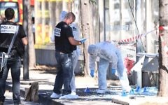 French criminal police join forensic police as they search the site following a car crash on August 21, 2017, in the southern Mediterranean city of Marseille that killed at least one person.( AFP PHOTO / Boris HORVAT)