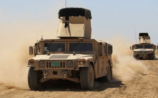 Iraqi forces, backed by Shiite militias, advance towards the city of Tal Afar on August 21, 2017. (AFP Photo/Ahmad al-Rubaye) Iraqi forces, backed by Shiite militias, advance towards the city of Tal Afar on August 21, 2017. (AFP Photo/Ahmad al-Rubaye)