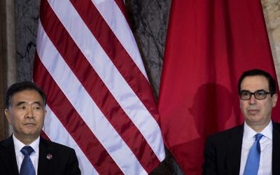 This file photo taken on July 19, 2017 shows Chinese Vice Premier Wang Yang (L) and US Secretary of the Treasury Steven Mnuchin during a US and China comprehensive Economic Dialogue at the US Department of the Treasury in Washington, DC.(AFP PHOTO / Brendan Smialowski)