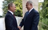 Russian President Vladimir Putin greets Prime Minister Benjamin Netanyahu ahead of their meeting in Sochi on August 23, 2017. (AFP/Sputnik/Alexey Nikolsky)