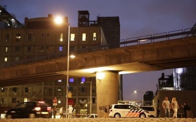 Illustrative: Police cars are seen near the concert venue Maassilo after a rock show was cancelled due to a terror threat, in Rotterdam, the Netherlands, on August 23, 2017. (AFP Photo/ANP/Arie Kievit)