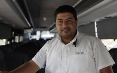 East Jerusalem Palestinian bus driver Ramadan Jamjoum poses on August 24, 2017 after he returned $10,000 to a Jewish man who left it in his vehicle. The passenger had forgotten the cash in Bnei Brak, a city near Tel Aviv dominated by ultra-Orthodox Jews. (AFP PHOTO / AHMAD GHARABLI)