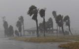 Strong winds batter a house on Padre Island before the approaching Hurricane Harvey in Corpus Christi, Texas on August 25, 2017. (AFP Photo/Mark Ralston)