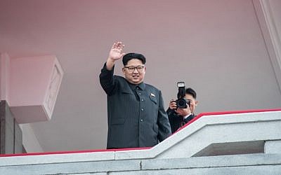 This file photo taken on May 10, 2016 shows North Korean leader Kim Jong-Un waving from a balcony of the Grand People's Study House to participants of a military parade and mass rally on Kim Il-Sung square in Pyongyang. (AFP PHOTO / Ed Jones)