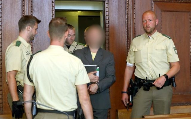 Wolfgang Plan, alleged member of the far-right movement "Citizens of the Reich" (Reichsbuerger), arrives at his trial at the Nuremberg-Fuerth Court in Nuremberg, southern Germany on August 29, 2017. (Daniel Karmann / dpa / AFP) Wolfgang Plan, alleged member of the far-right movement "Citizens of the Reich" (Reichsbuerger), arrives at his trial at the Nuremberg-Fuerth Court in Nuremberg, southern Germany on August 29, 2017. (Daniel Karmann / dpa / AFP)