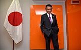Japan's Deputy Prime Minister and Finance Minister Taro Aso posing before a meeting during a G7 summit of Finance Ministers in Bari, May 13, 2017. (AFP/Alberto PIZZOLI)