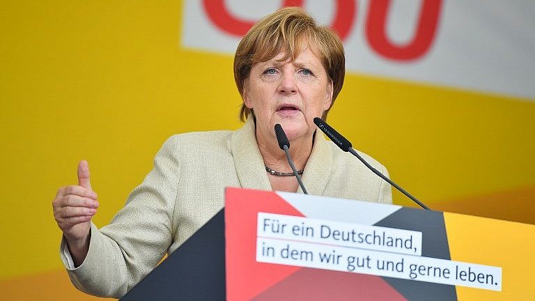 German Chancellor Angela Merkel addresses an election campaign rally for her Christian Democratic Union party in Ludwigshafen, Germany, on August 30, 2017. (AFP Photo/dpa/Uwe Anspach)