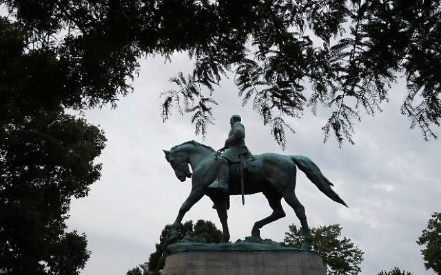 The statue of Confederat Gen. Robert E. Lee stands in the center of Emancipation Park the day after the Unite the Right rally devolved into violence August 13, 2017 in Charlottesville, Virginia. (Chip Somodevilla/Getty Images/AFP) The statue of Confederat Gen. Robert E. Lee stands in the center of Emancipation Park the day after the Unite the Right rally devolved into violence August 13, 2017 in Charlottesville, Virginia. (Chip Somodevilla/Getty Images/AFP)