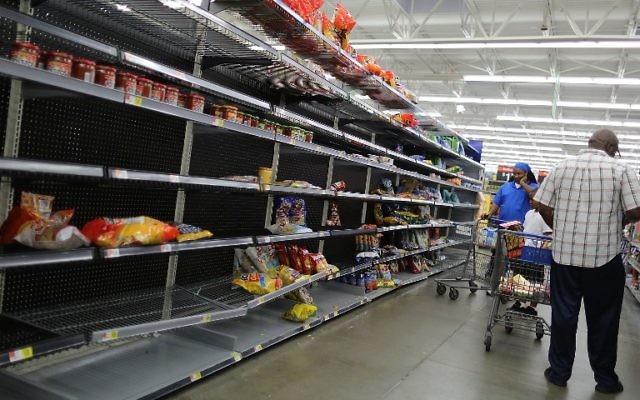 The chips and other bagged foods section of a Walmart store is almost empty as people prepare for the arrival of Hurricane Harvey on August 24, 2017 in Houston, Texas. (Joe Raedle/Getty Images/AFP) The chips and other bagged foods section of a Walmart store is almost empty as people prepare for the arrival of Hurricane Harvey on August 24, 2017 in Houston, Texas. (Joe Raedle/Getty Images/AFP)