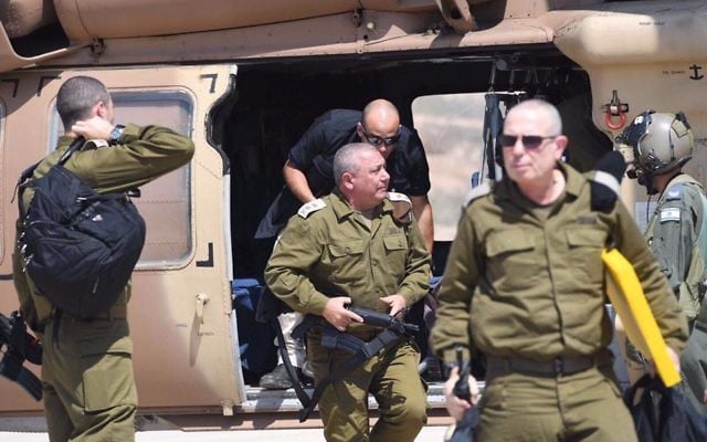 IDF Chief of Staff Gadi Eisenkot gets out of a helicopter ahead of a tour of the barrier surrounding the southern West Bank on August 8, 2017. (Israel Defense Forces/Facebook) IDF Chief of Staff Gadi Eisenkot gets out of a helicopter ahead of a tour of the barrier surrounding the southern West Bank on August 8, 2017. (Israel Defense Forces/Facebook)