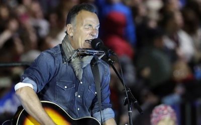 In this Nov. 7, 2016, photo Bruce Springsteen performs during a Hillary Clinton campaign event at Independence Mall in Philadelphia. (AP Photo/Matt Slocum)