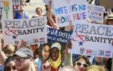 Illustrative: Protesters listen during a 'Peace and Sanity' rally Sunday Aug. 13, 2017, in the Brooklyn borough of New York, during a rally about white supremacy violence in Charlottesville, Va. (AP/Bebeto Matthews)
