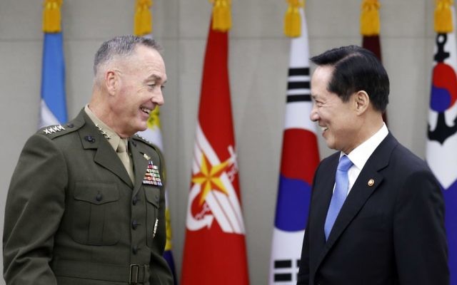 US Joint Chiefs Chairman Gen. Joseph Dunford, left, shakes hands with South Korean Defense Minister Song Young-moo during their meeting at the Defense Ministry in Seoul, South Korea, August 14, 2017. (Kim Hong-Ji/Pool Photo via AP)