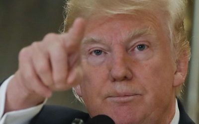 In this Aug. 15, 2017, photo, President Donald Trump points to members of the media as he answers questions in the lobby of Trump Tower in New York. (AP Photo/Pablo Martinez Monsivais)