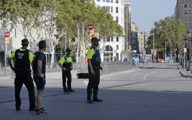 Police officers cordon off a street in Barcelona, Spain, Thursday, Aug. 17, 2017, following a terror attack. (AP Photo/Manu Fernandez) Police officers cordon off a street in Barcelona, Spain, Thursday, Aug. 17, 2017, following a terror attack. (AP Photo/Manu Fernandez)