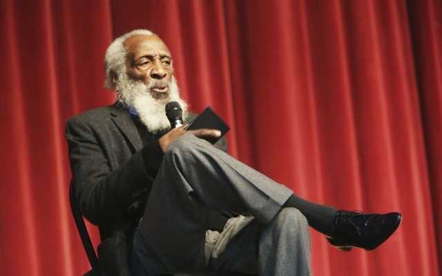 Civil rights activist, writer, social critic, and comedian Dick Gregory, talks to the crowd at the 16th annual Tampa Bay Black Heritage Festival, MLK Leadership Luncheon, January 20, 2016. (Scott Keeler/Tampa Bay Times via AP) Civil rights activist, writer, social critic, and comedian Dick Gregory, talks to the crowd at the 16th annual Tampa Bay Black Heritage Festival, MLK Leadership Luncheon, January 20, 2016. (Scott Keeler/Tampa Bay Times via AP)