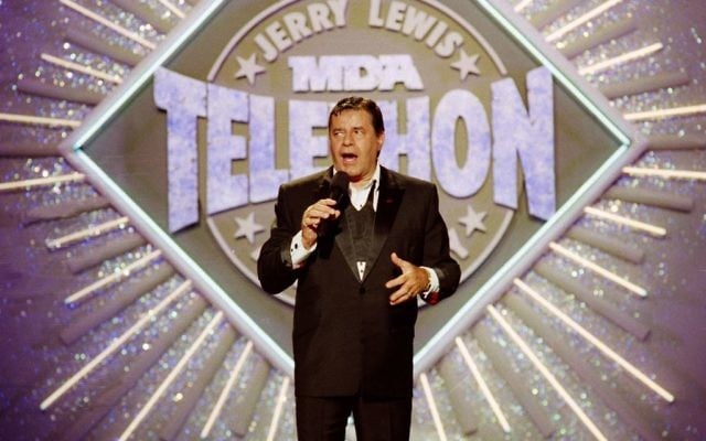 Entertainer Jerry Lewis makes his opening remarks at the 25th Anniversary of the Jerry Lewis MDA Labor Day Telethon fundraiser in Los Angeles, September 2, 1990. (AP Photo/Julie Markes/File) Entertainer Jerry Lewis makes his opening remarks at the 25th Anniversary of the Jerry Lewis MDA Labor Day Telethon fundraiser in Los Angeles, September 2, 1990. (AP Photo/Julie Markes/File)