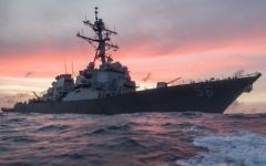 In this Jan. 22, 2017, photo provided by US Navy, the USS John S. McCain conducts a patrol in the South China Sea while supporting security efforts in the region. (James Vazquez/US Navy via AP)