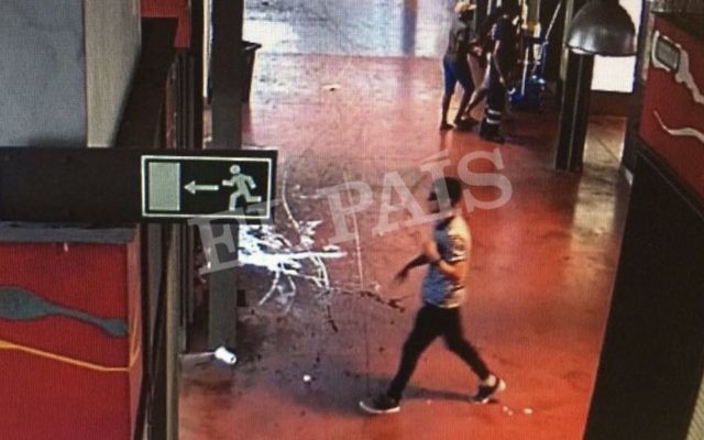 In this watermarked frame grab from CCTV released by the Spanish newspaper El Pais on Monday Aug. 21, 2017, a suspect. believed to be Younes Abouyaaqoub is is captured by a security camera walking through La Boqueria market seconds after a van crashed into pedestrians in Barcelona last August 17. (EL Pais, via AP) In this watermarked frame grab from CCTV released by the Spanish newspaper El Pais on Monday Aug. 21, 2017, a suspect. believed to be Younes Abouyaaqoub is is captured by a security camera walking through La Boqueria market seconds after a van crashed into pedestrians in Barcelona last August 17. (EL Pais, via AP)