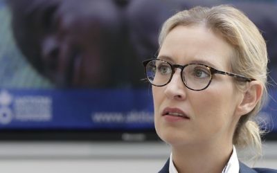 In this Aug. 21, 2017 photo, Alice Weidel, co-top candidate of the German AfD (Alternative for Germany) party for the upcoming general elections, awaits a press conference in Berlin, Germany. (AP Photo/Michael Sohn)