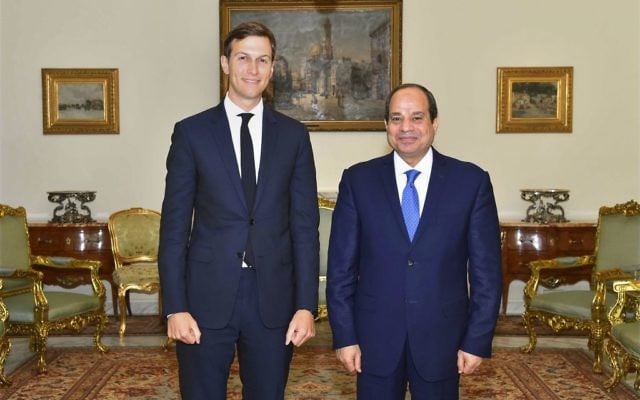 Egypt's President Abdel-Fattah el-Sissi, right, poses for a photo with White House adviser Jared Kushner, in Cairo, Egypt, August 23, 2017. (MENA via AP)