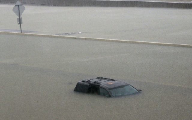 An abandoned vehicle sits in flood waters on the I-10 highway in Houston, Sunday, August 27, 2017. (AP Photo/LM Otero) An abandoned vehicle sits in flood waters on the I-10 highway in Houston, Sunday, August 27, 2017. (AP Photo/LM Otero)