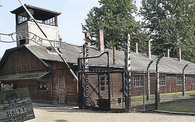 This file photo from July 29, 2016, shows the main gate of the former German Nazi death camp of Auschwitz, Poland. (AP Photo/Czarek Sokolowski)