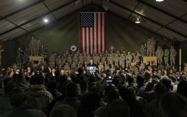 President George W. Bush talks with US troops, December 14, 2008 at Bagram Air Base, Afghanistan. (AP Photo/Evan Vucci)
